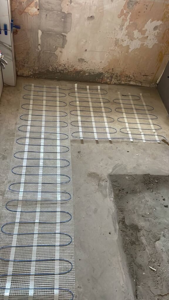 Installatie van vloerverwarming in woning door vakman